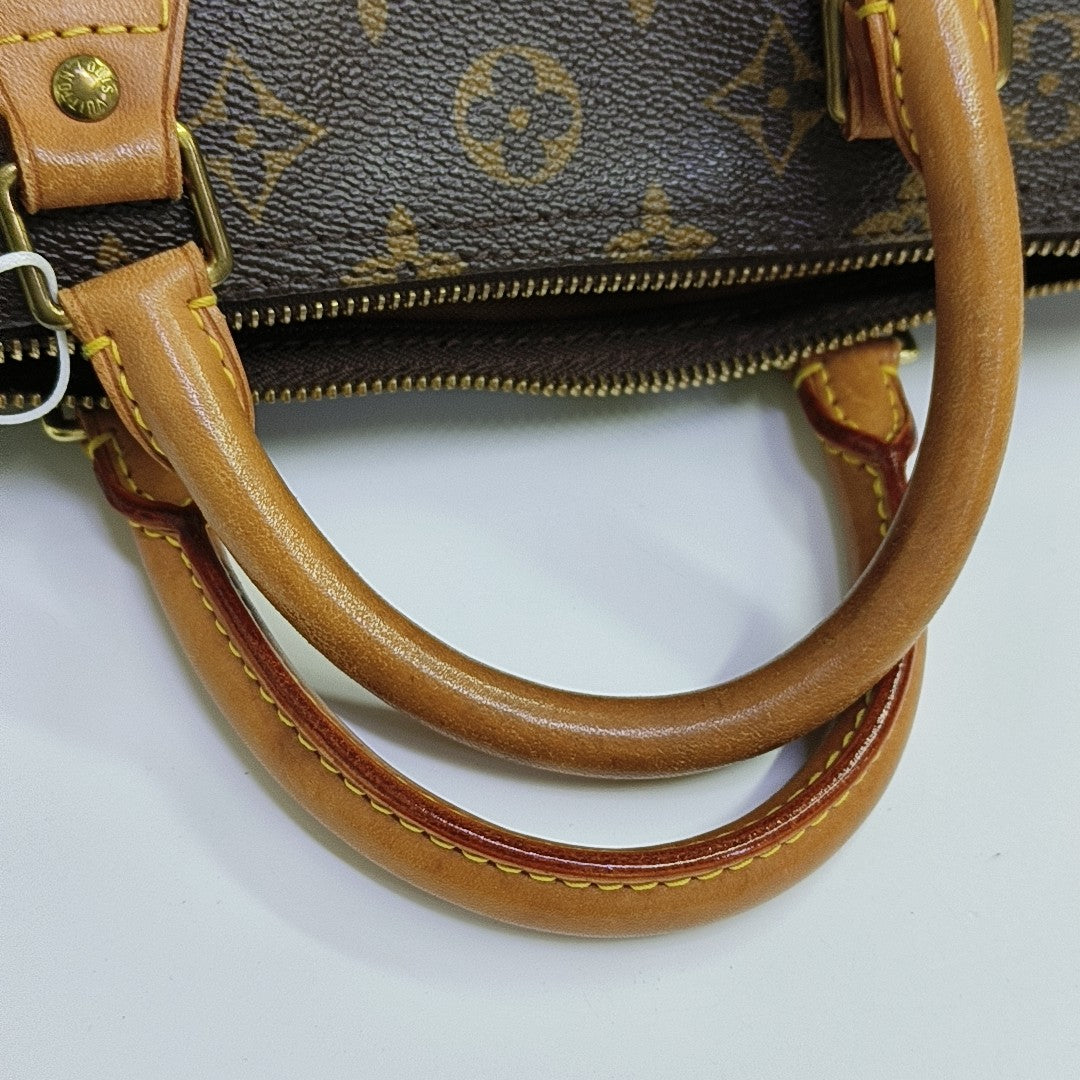 SPEEDY 30 Monogram Coated Canvas Brown