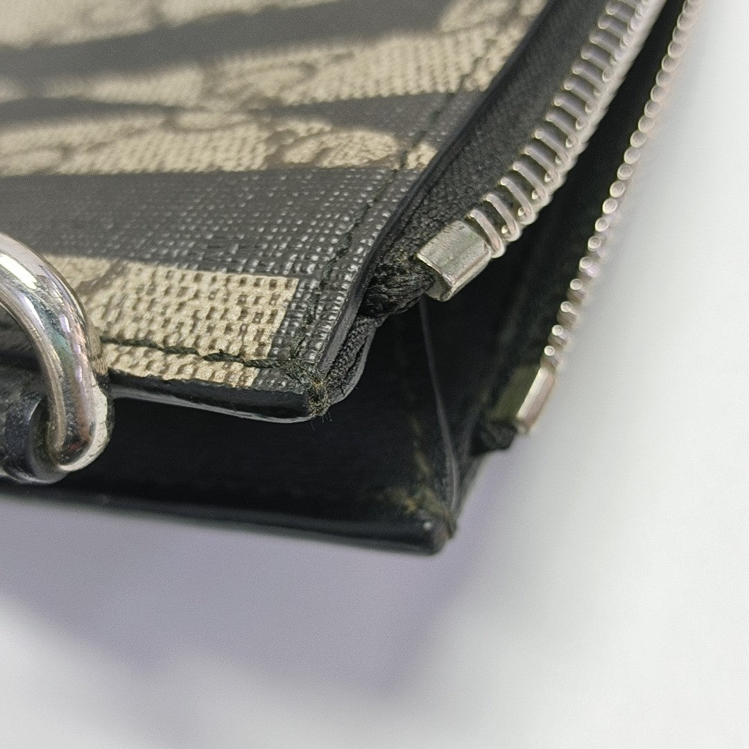 Monogram Coated Canvas Clutch Multicolor