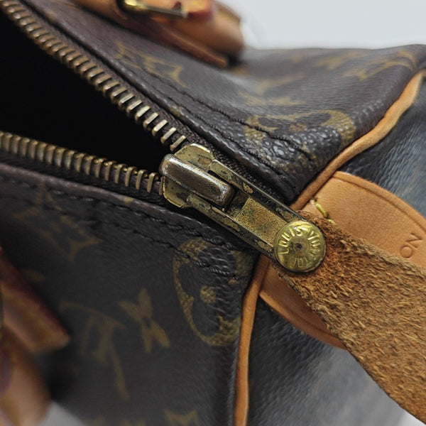 SPEEDY 25 Monogram Coated Canvas Brown