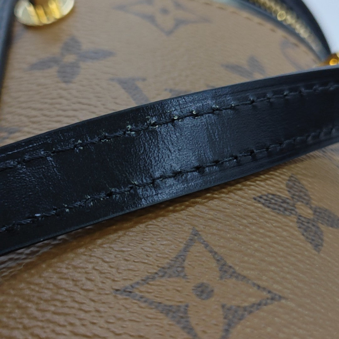 CANNES PM Monogram Coated Canvas Brown