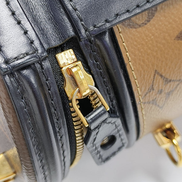 CANNES PM Monogram Coated Canvas Brown