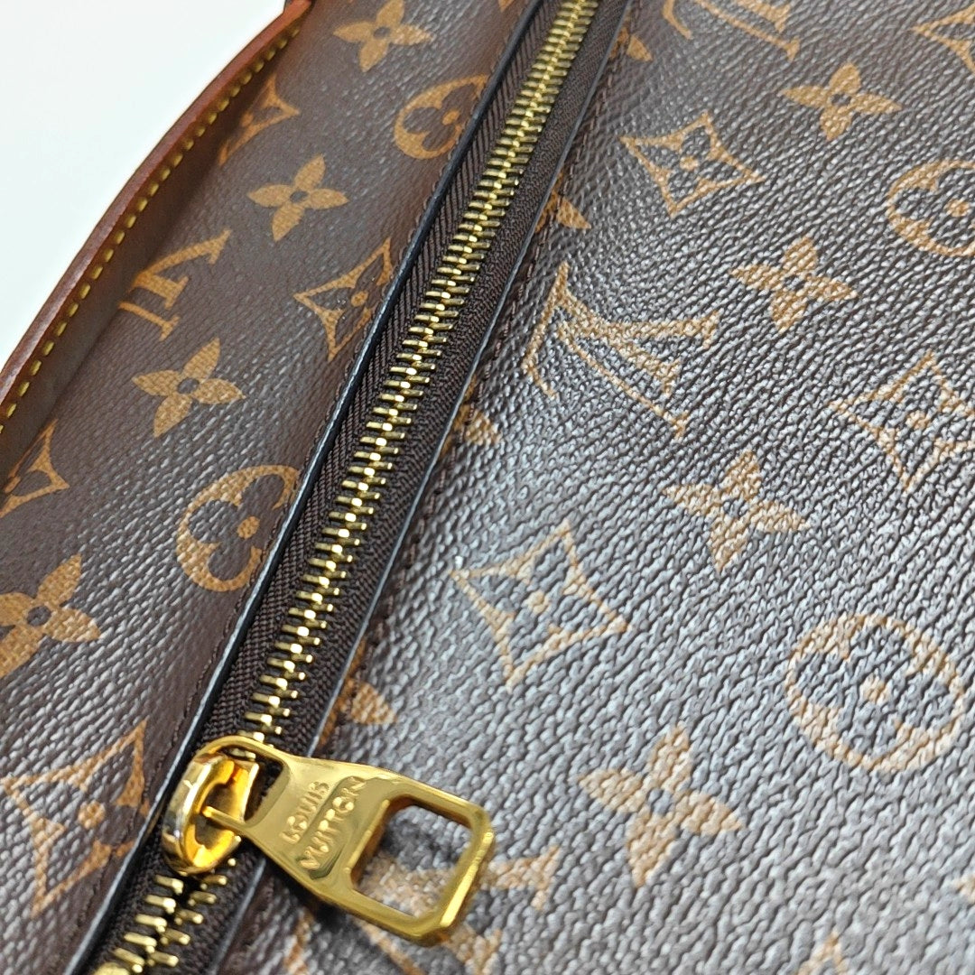 MÉTIS MM Monogram Coated Canvas Brown