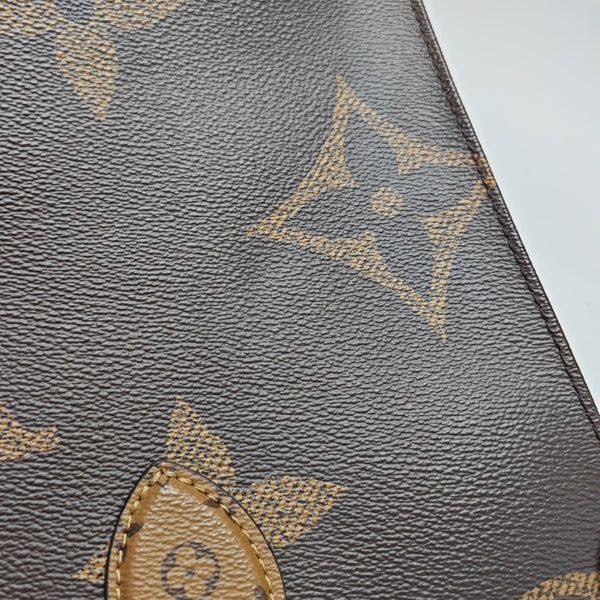 ONTHEGO MM Monogram Coated Canvas Brown