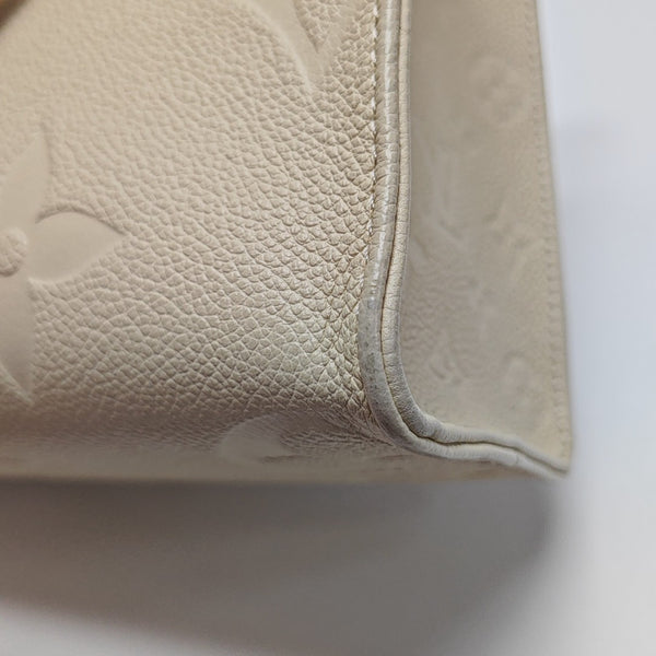 ONTHEGO PM Monogram Calfskin Beige