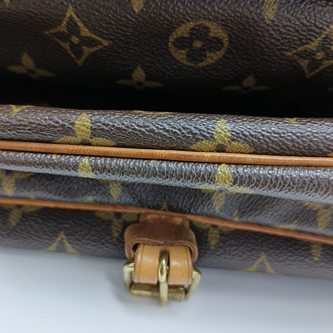 SAUMUR Monogram Coated Canvas Brown