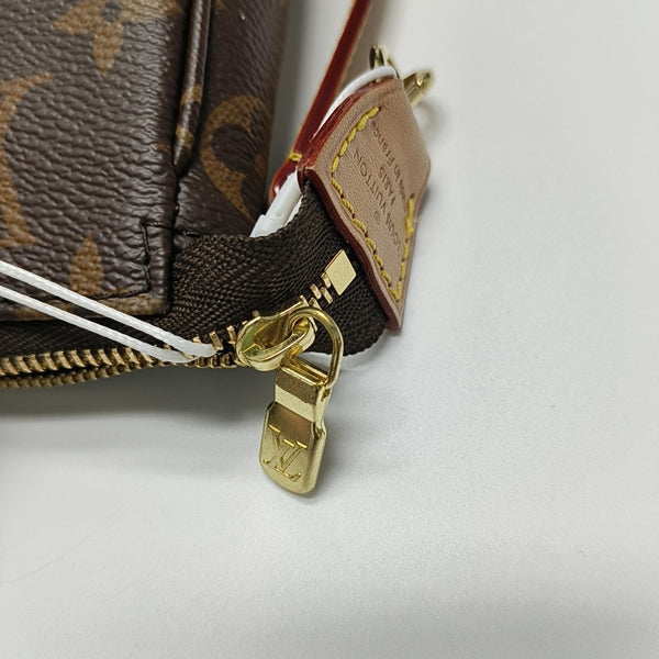 ACCESSOIRES GM Monogram Coated Canvas Brown