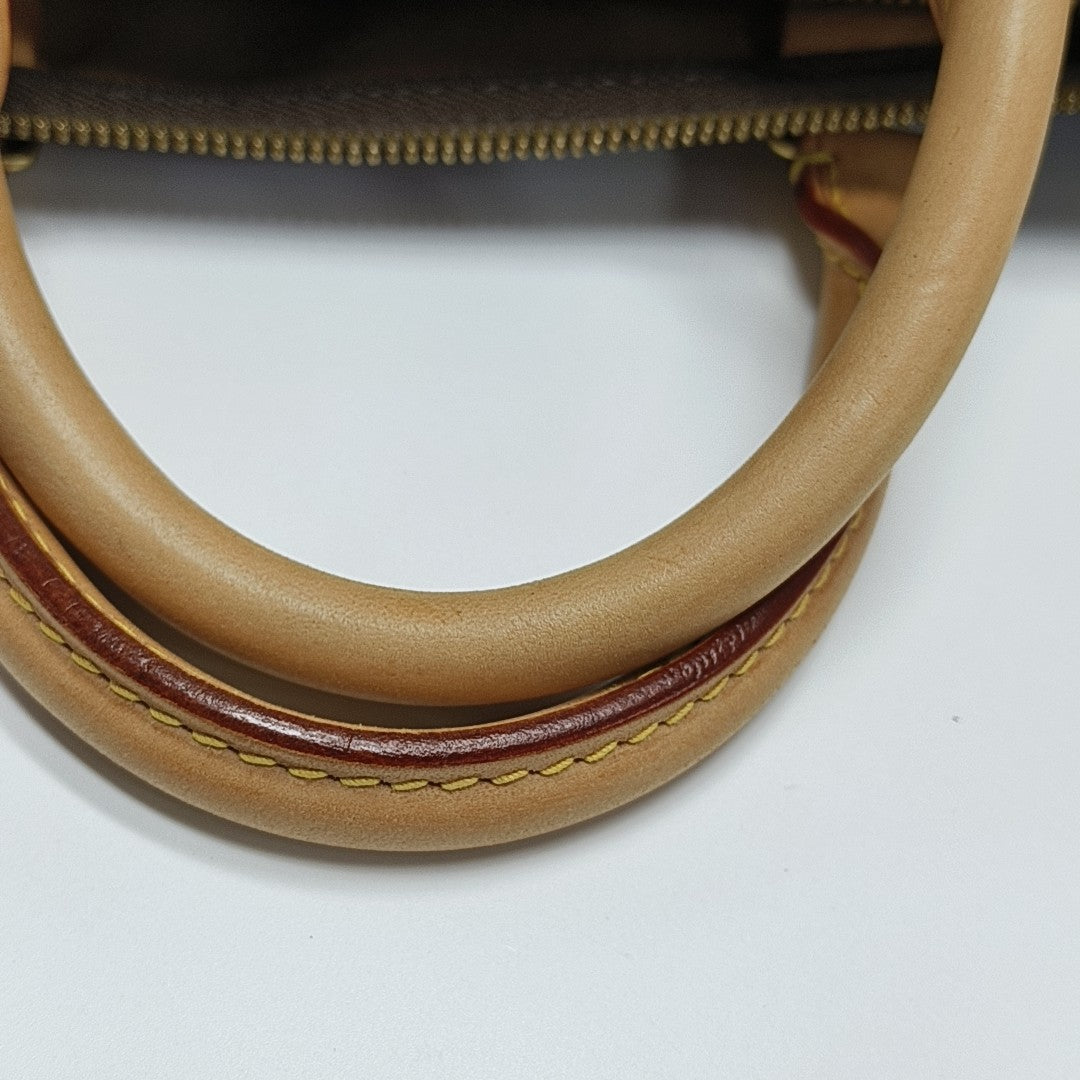 SPEEDY 30 Monogram Coated Canvas Brown
