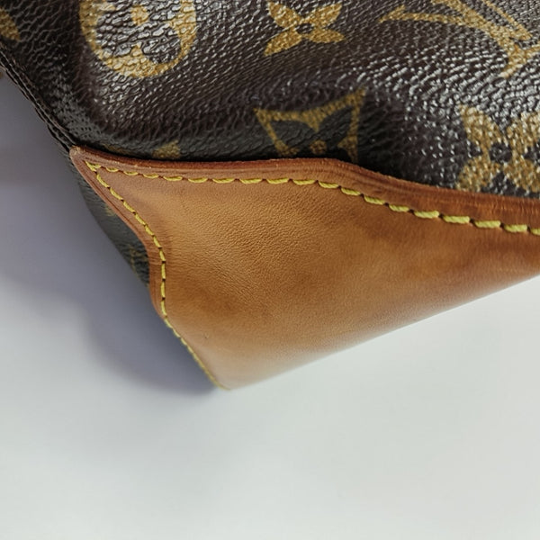 PIANO Monogram Coated Canvas Brown