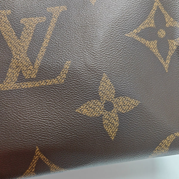 ONTHEGO MM Monogram Coated Canvas Brown