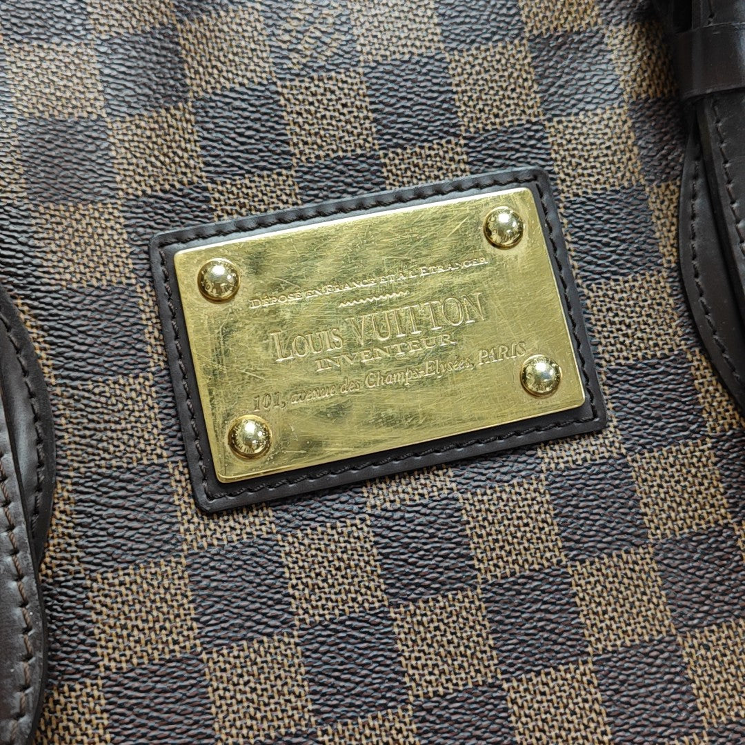 HAMPSTEAD MM Damier Ebene Coated Canvas Brown