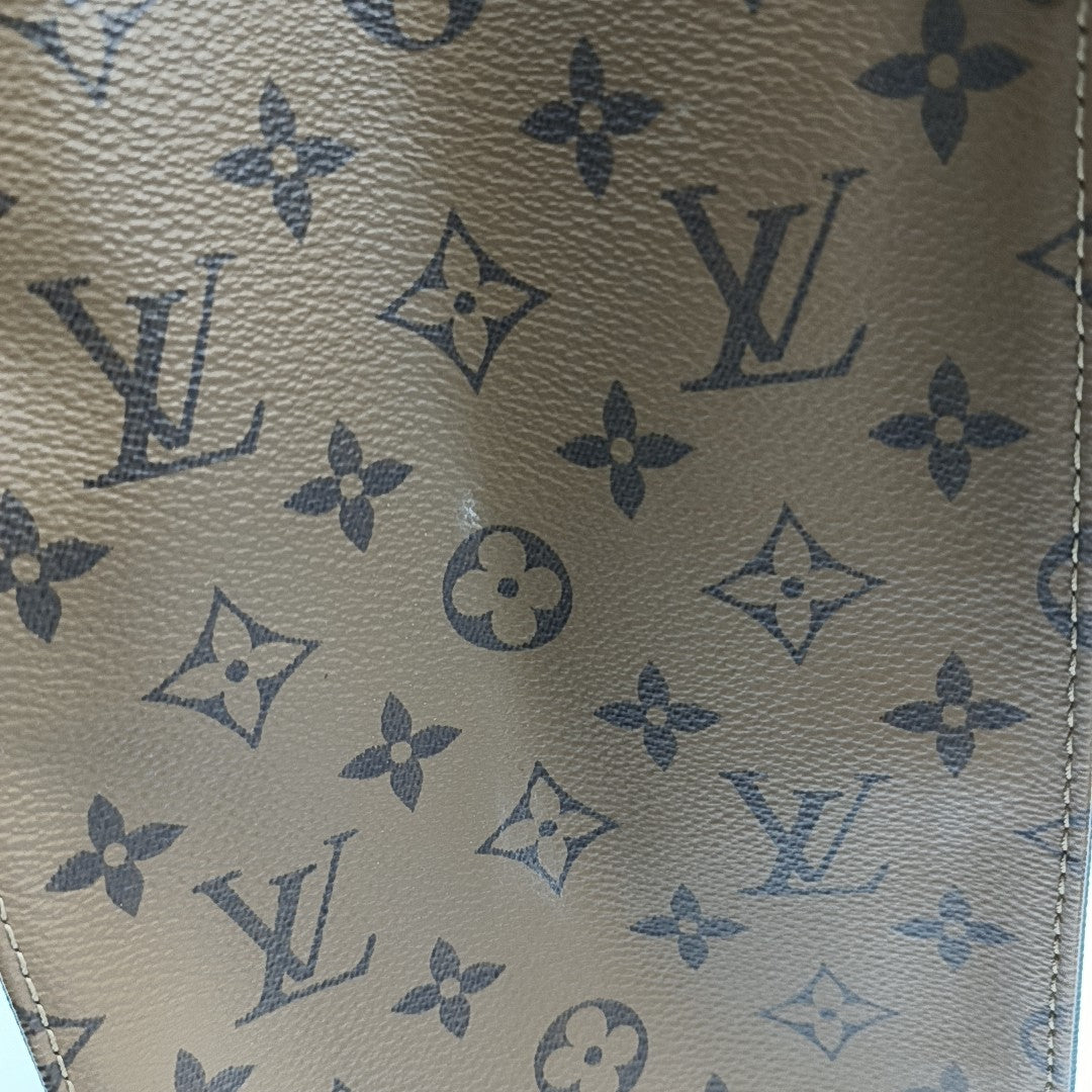 ONTHEGO MM Monogram Coated Canvas Brown