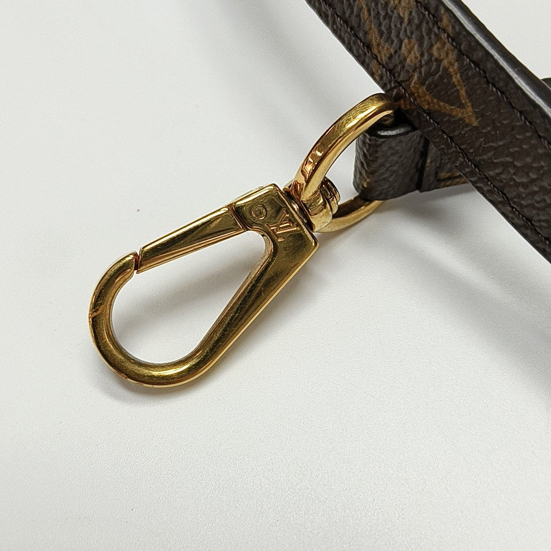 MONTAIGNE GM Monogram Coated Canvas Brown