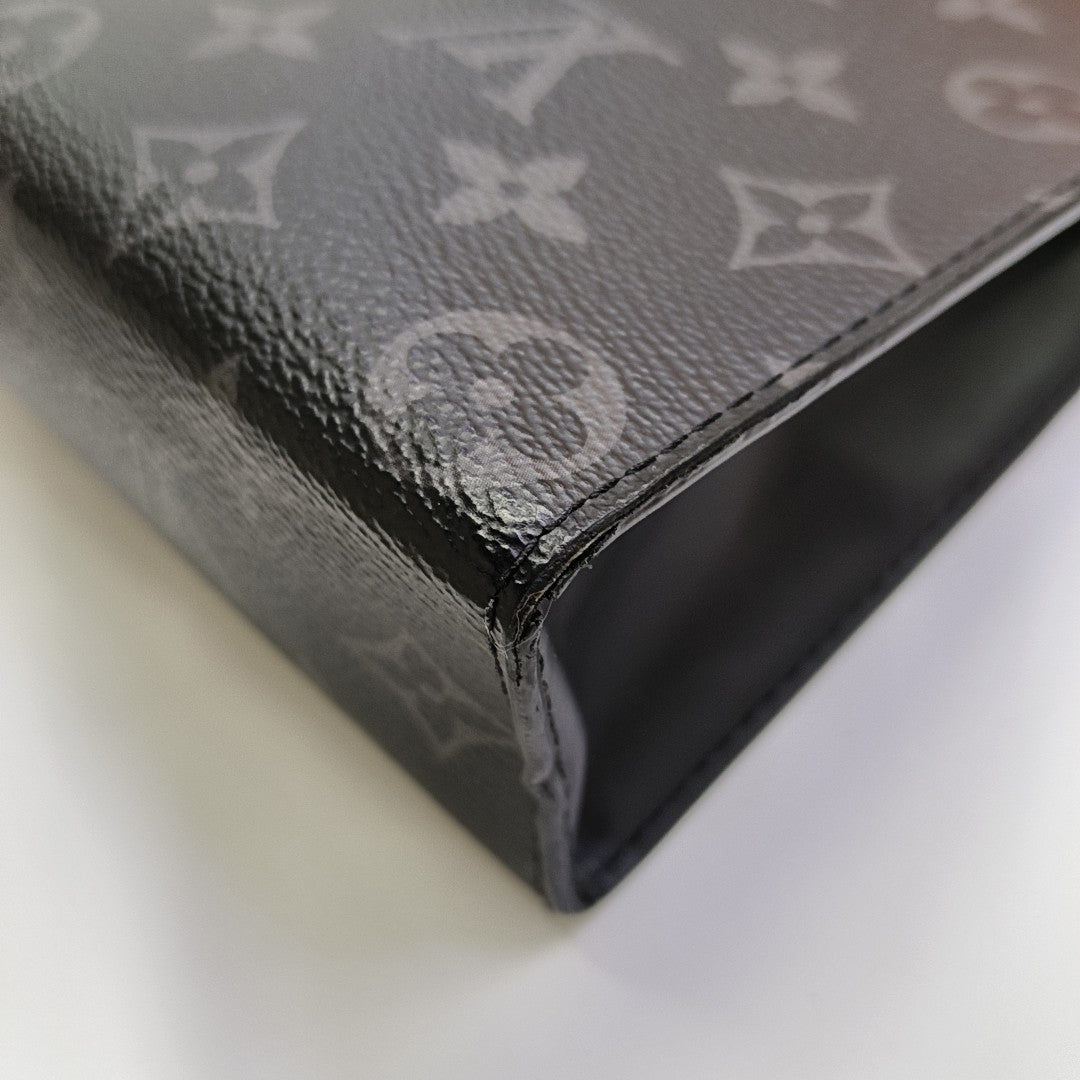 Pochette Voyag MM Monogram Coated Canvas Black