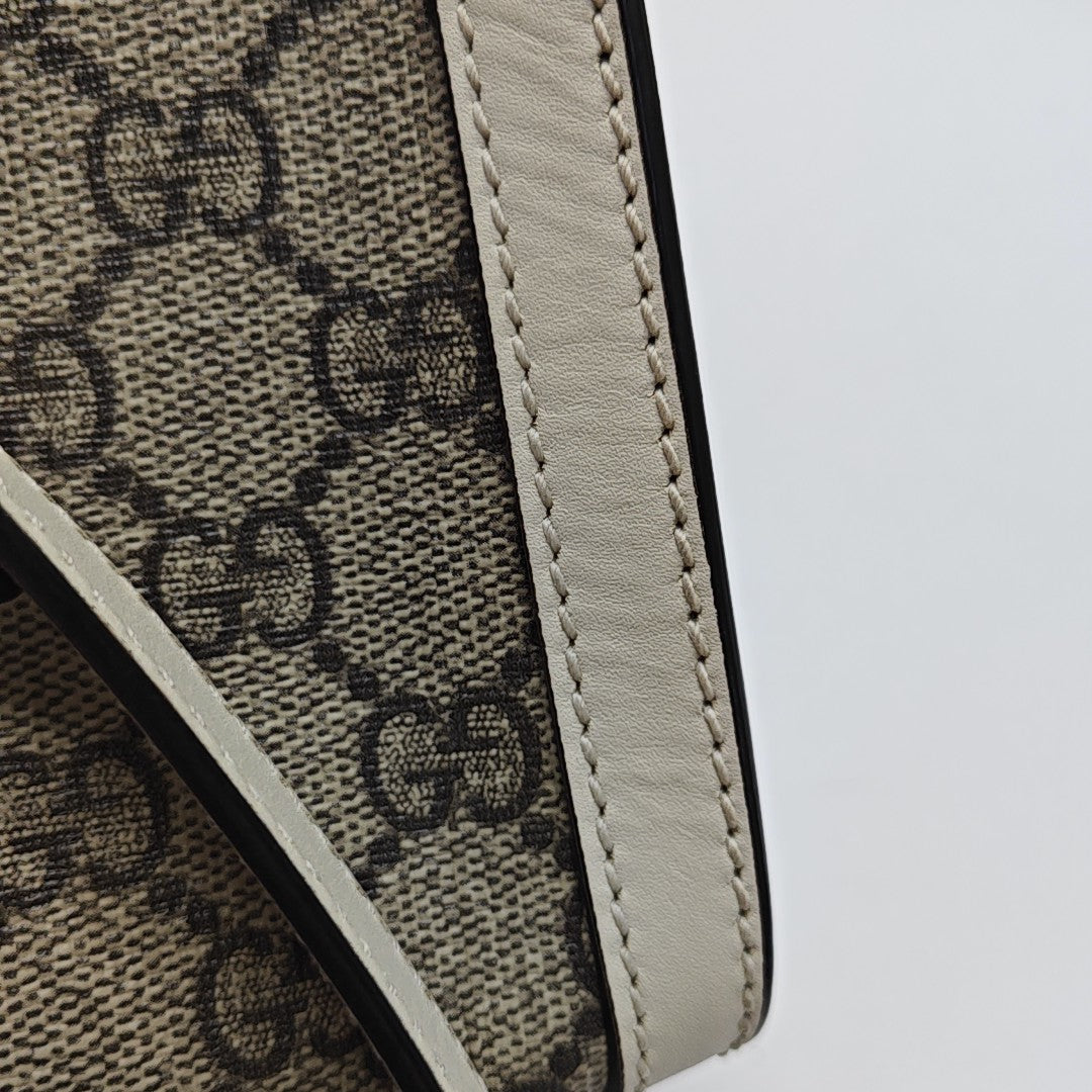 Padlock Small Monogram Coated Canvas Beige