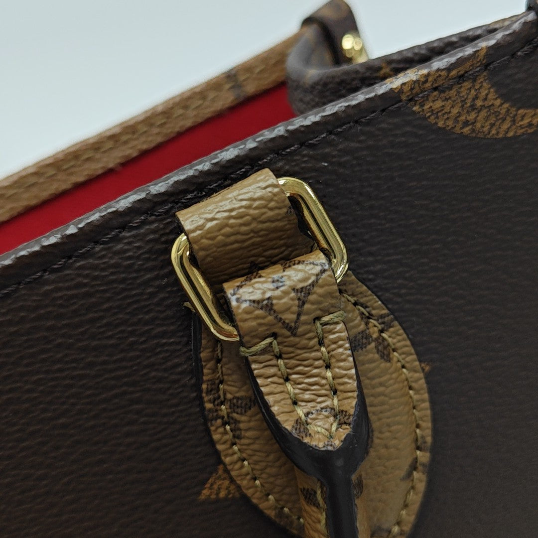 ONTHEGO PM Monogram Coated Canvas Brown