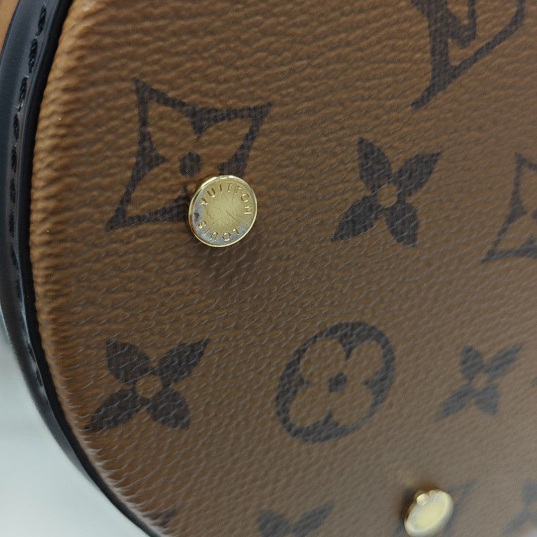 CANNES PM Monogram Coated Canvas Brown