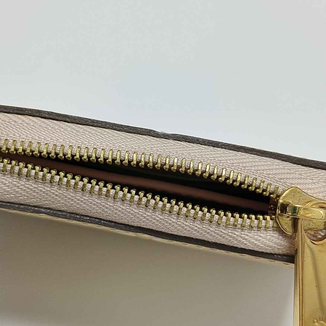 ZIPPY Monogram Patent Leather Yellow Wallet