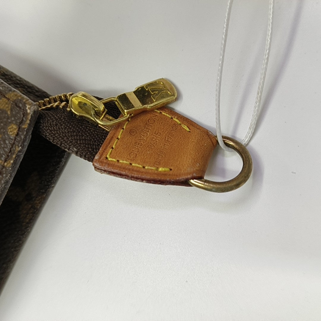 Monogram Coated Canvas Clutch Brown