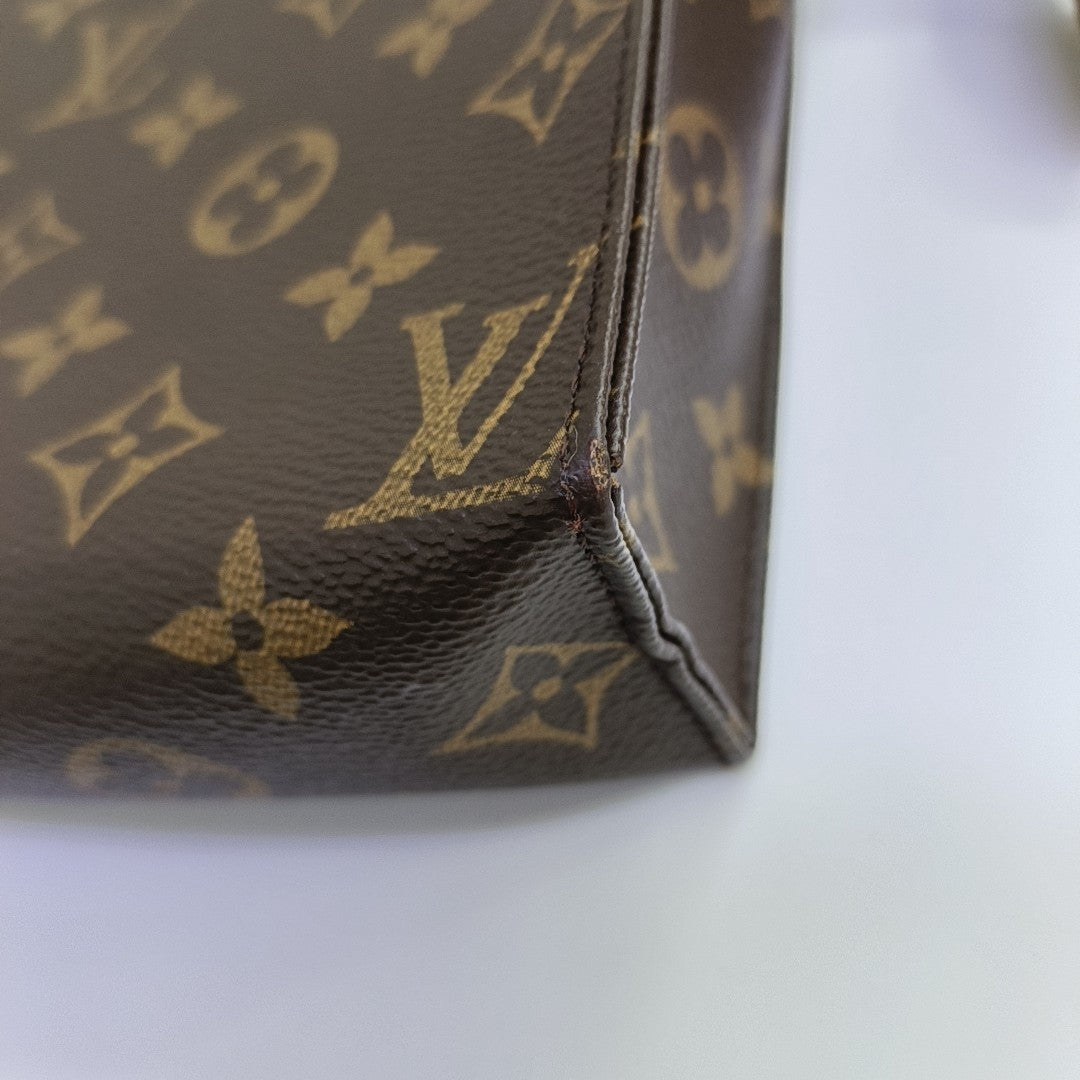 TOILET POCKET 19 Monogram Coated Canvas Brown