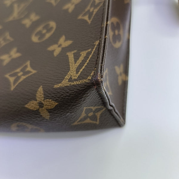 TOILET POCKET 19 Monogram Coated Canvas Brown