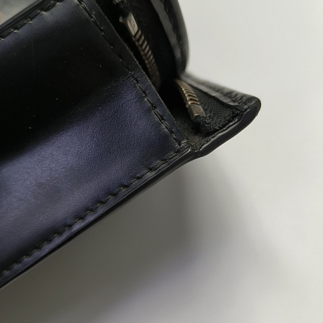 Pochette Voyag MM Monogram Coated Canvas Black