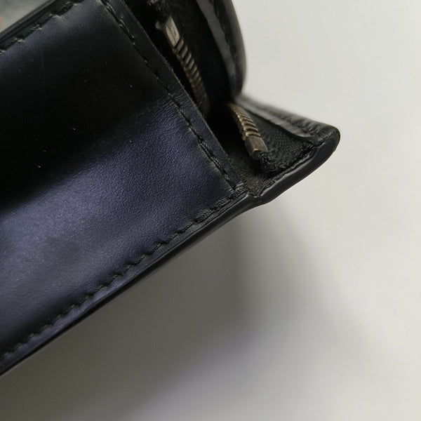 Pochette Voyag MM Monogram Coated Canvas Black