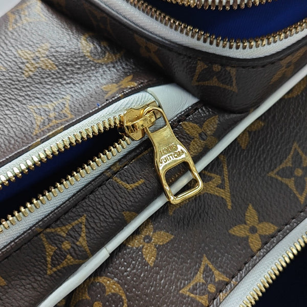 Monogram Coated Canvas Backpack Brown