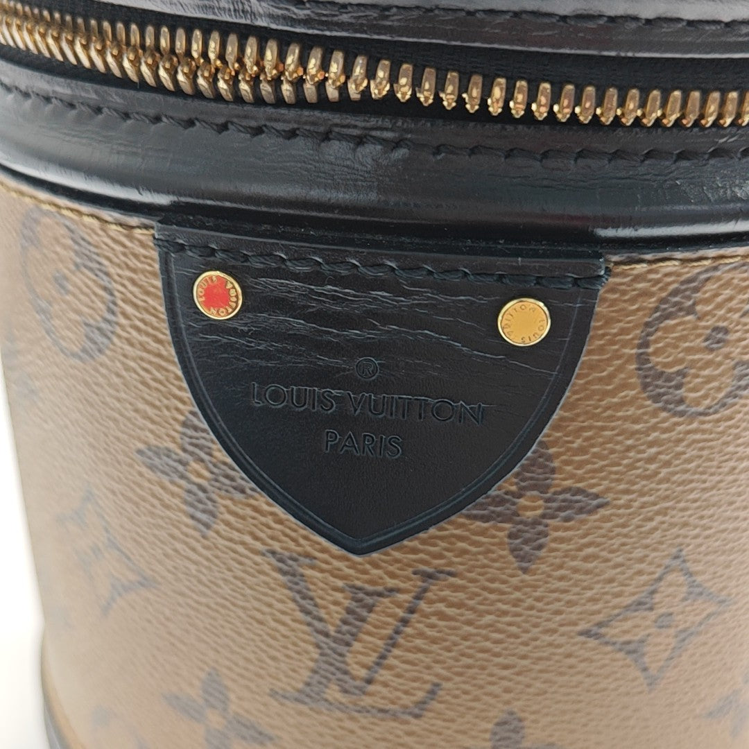 CANNES PM Monogram Coated Canvas Brown