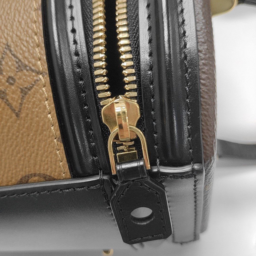 CANNES PM Monogram Coated Canvas Brown