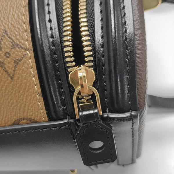 CANNES PM Monogram Coated Canvas Brown
