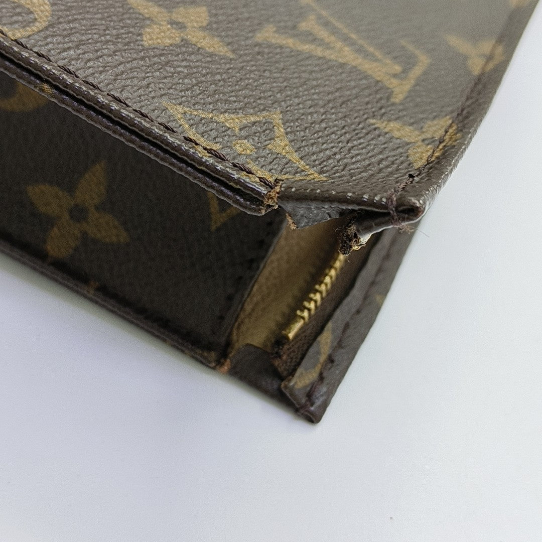TOILET POCKET 26 Monogram Coated Canvas Brown