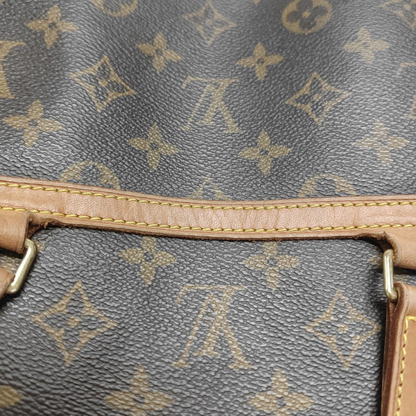 COUSSIN GM Monogram Coated Canvas Brown