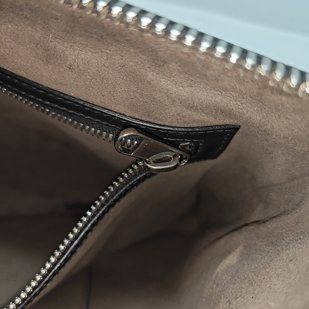 Monogram Coated Canvas Clutch Brown
