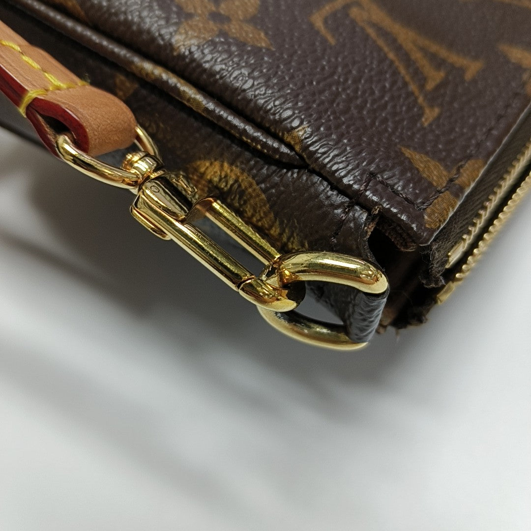 POCHETTE ACCESSOIRES GM Monogram Coated Canvas Brown