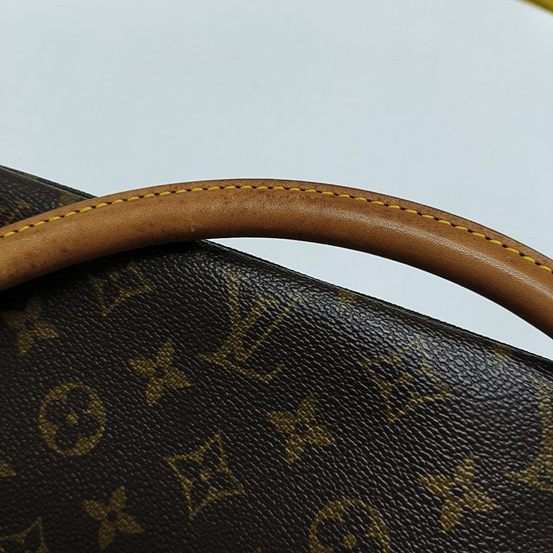 LOOPING PM Monogram Coated Canvas Brown