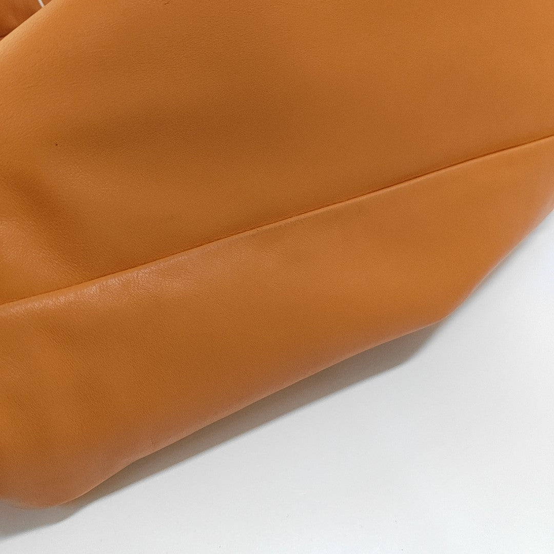 Authenticated pre-owned  The Pouch Calfskin Orange - Top Handle Bag at Looply