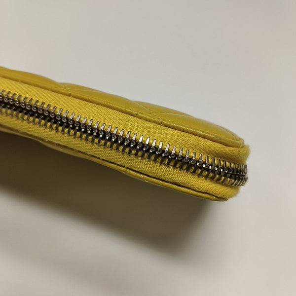Authenticated pre-owned  WOC Quilted Lambskin Yellow Wallet - Wallet at Looply