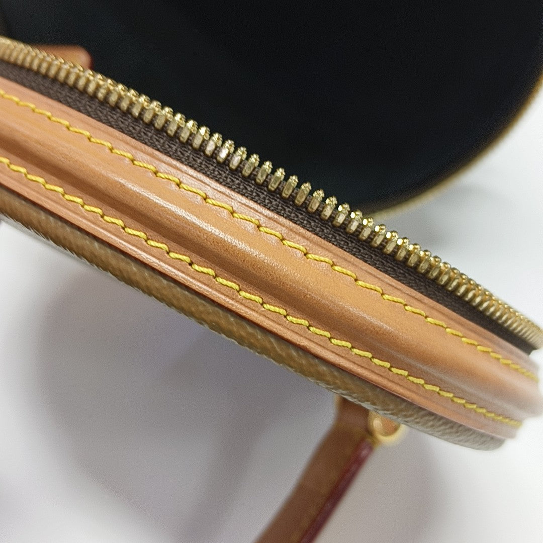 CANNES Monogram Coated Canvas Brown