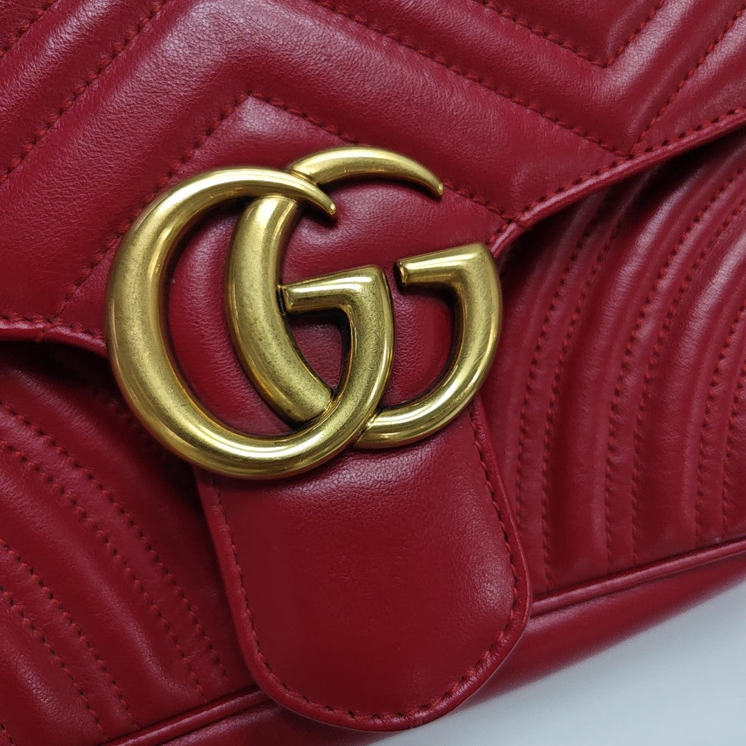 Authenticated pre-owned  GG Marmont Medium Quilted Calfskin Red - Shoulder Bag at Looply