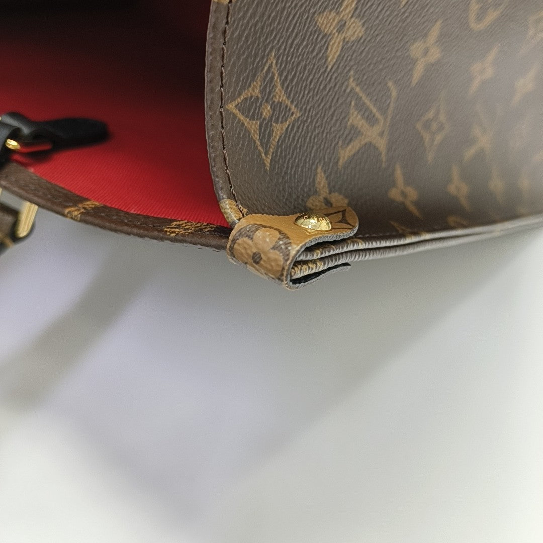 ONTHEGO MM Monogram Coated Canvas Brown