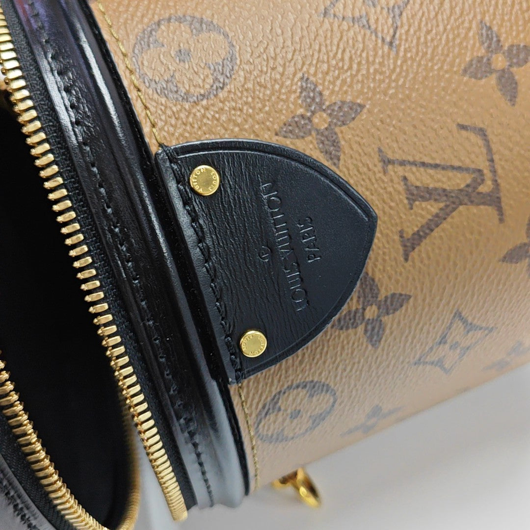 CANNES PM Monogram Coated Canvas Brown