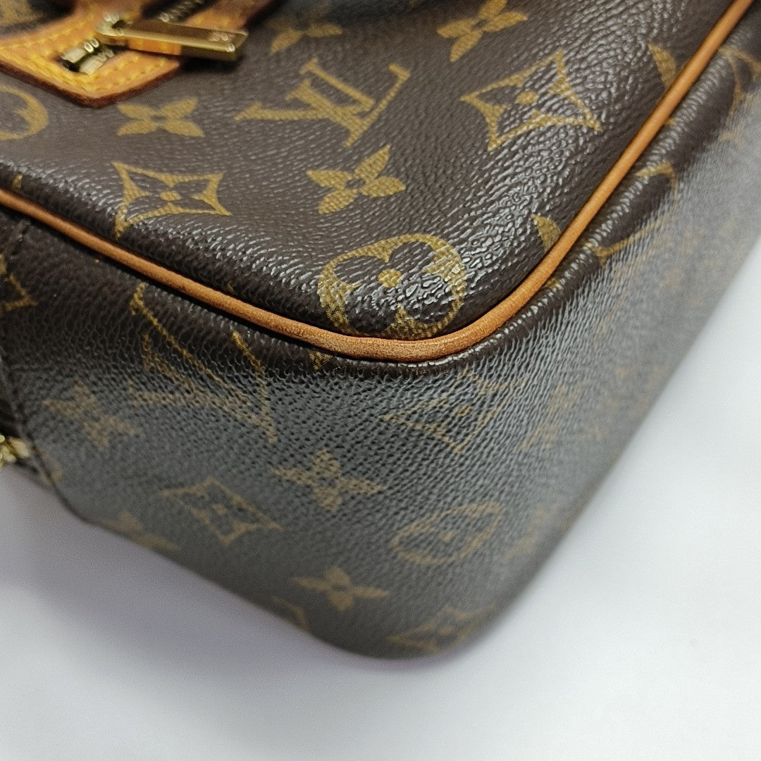 CITE MM Monogram Coated Canvas Brown