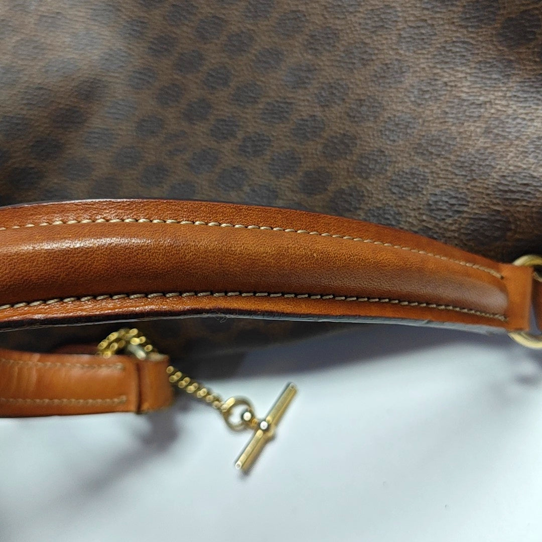 Authenticated pre-owned  MACADAM BLASON TRIOMPHE Coated Canvas Brown - Top Handle Bag at Looply