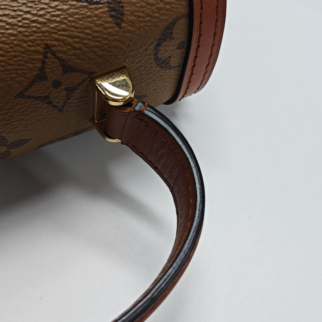 Monogram Coated Canvas Backpack PM Brown