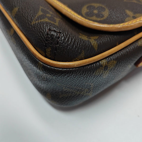 TIKAL Monogram Coated Canvas Brown