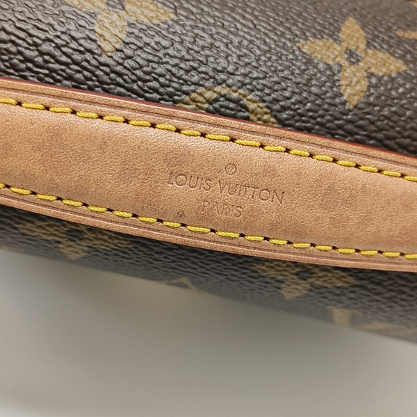 MÉTIS EAST WEST Monogram Coated Canvas Brown