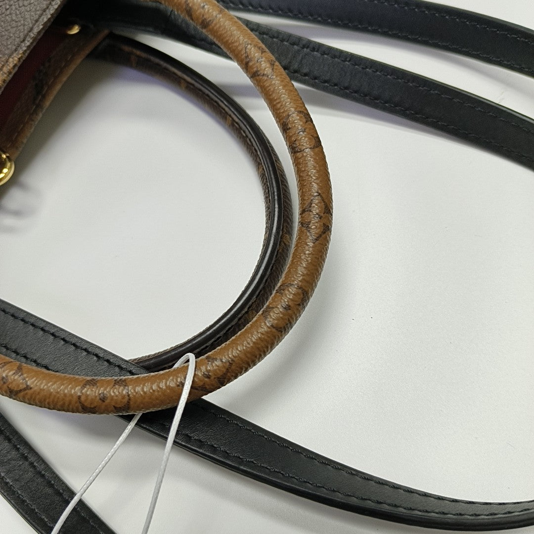ONTHEGO MM Monogram Coated Canvas Brown