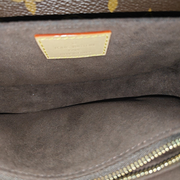 MÉTIS EAST WEST Monogram Coated Canvas Brown