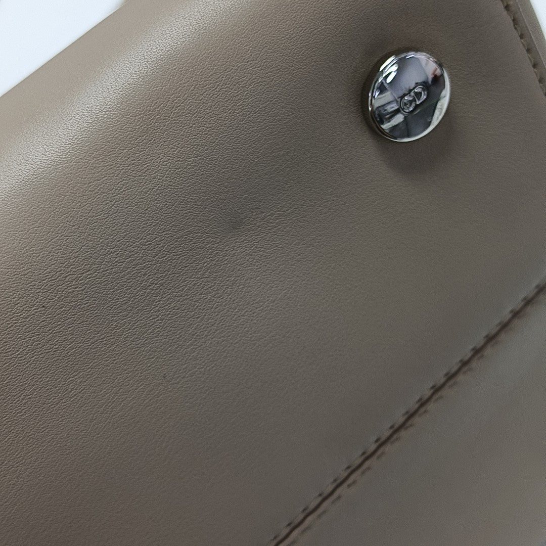 Christian Addict Calfskin Beige