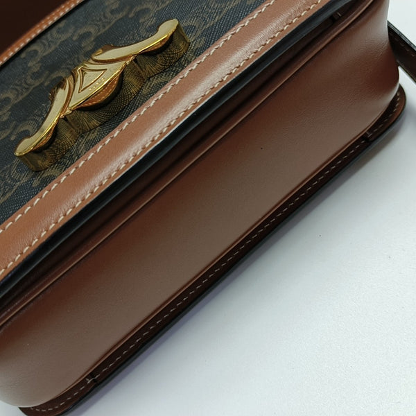 TRIOMPHE Small Coated Canvas Brown
